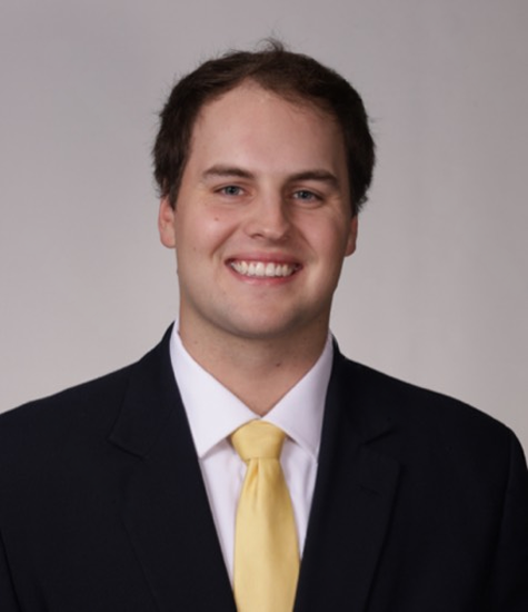 Professional headshot of William Puls